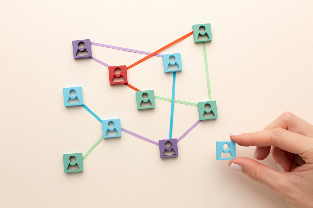 person holding small pieces with her hands symbolizing the event sponsorship relationship  