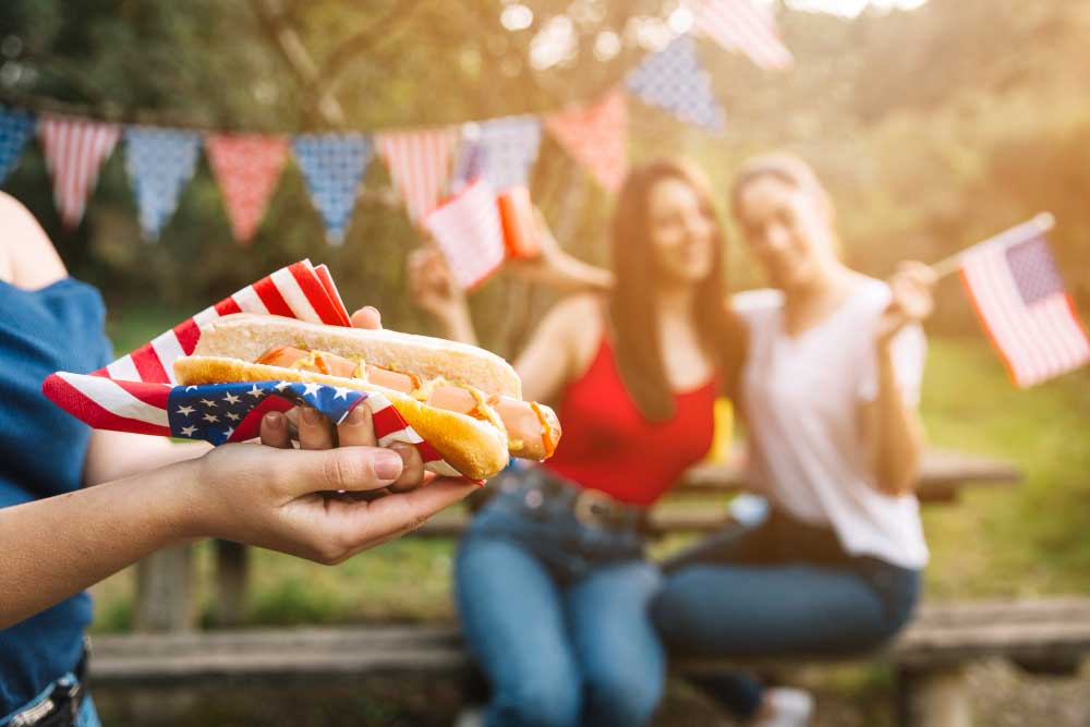 attracting tourists by promoting local events and festivals, such as fourth of July celebration